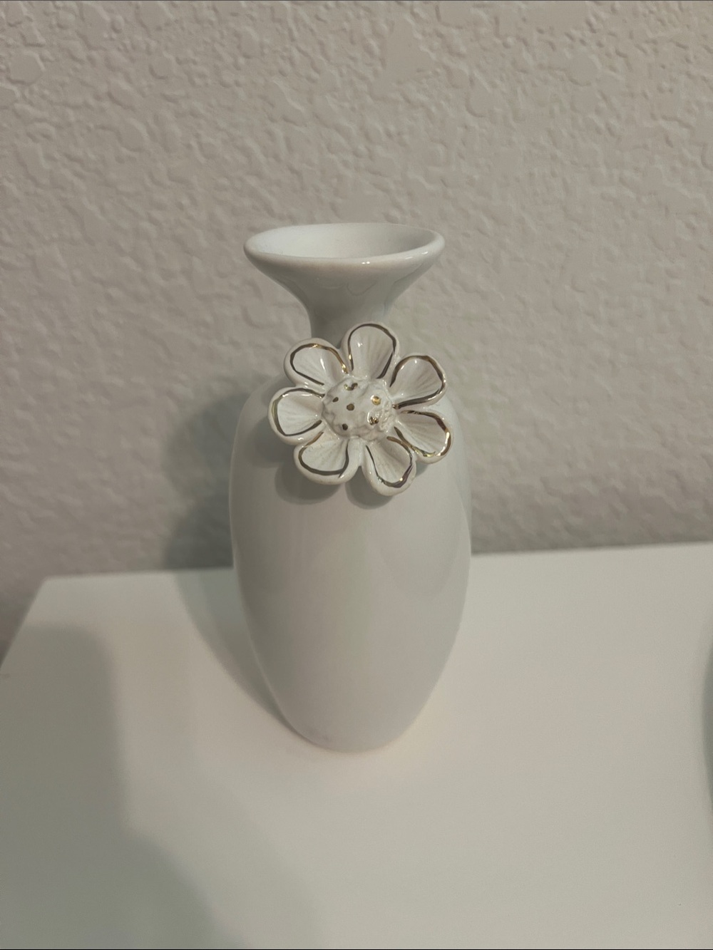White Ceramic Bud Vase with Decorative Flower Accent